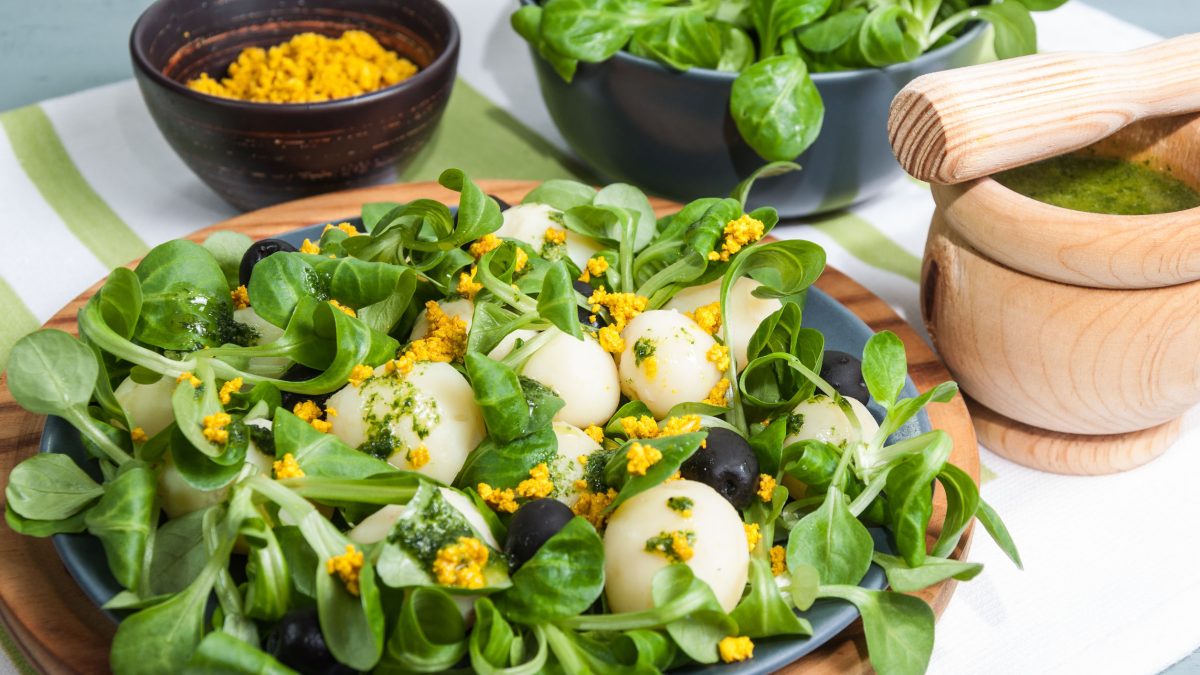58943939 - salad plate of lettuce, potatoes, tofu and turmeric