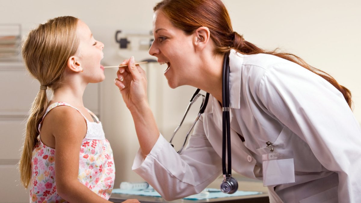 Doctor Giving Little Girl a Medical Exam