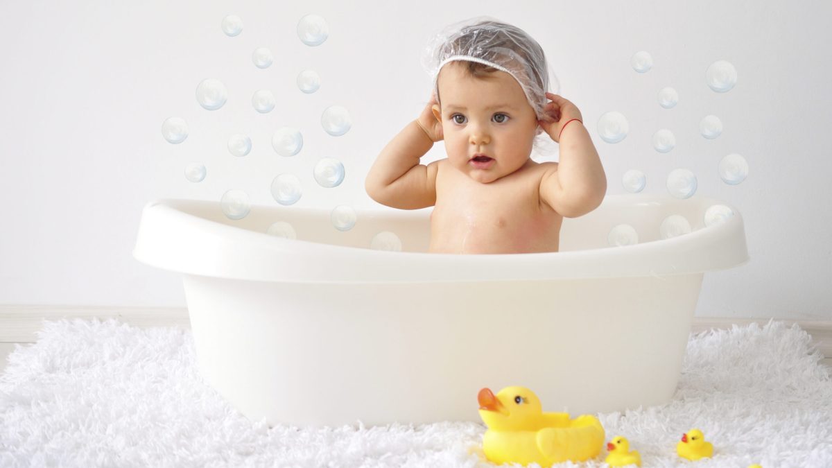 Adorable Baby Girl Taking a Bath