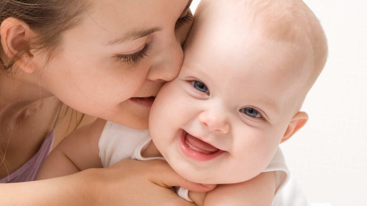 Mother's love. Cute baby 6 month with mother.